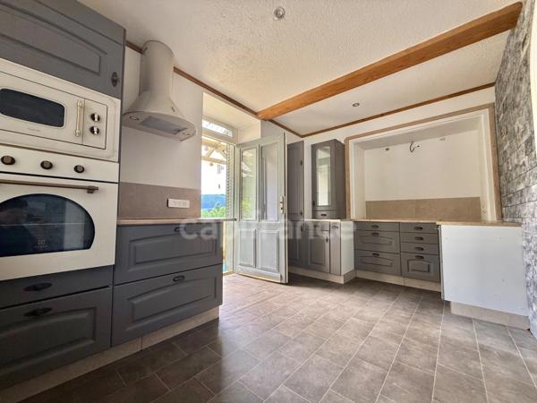 MAISON DE 80 M², TERRAIN CLOS DE 670 M², TERRASSE DE 35 M², 3 CHAMBRES ET 3 GARAGES