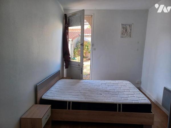CENTRE -PLAIN-PIED AVEC GARAGE ET JARDIN
