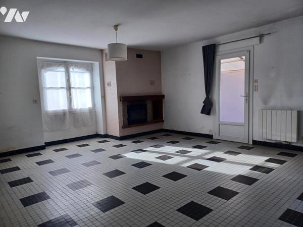 CENTRE -PLAIN-PIED AVEC GARAGE ET JARDIN