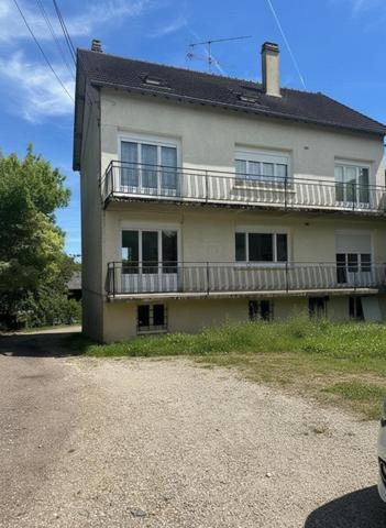 Immeuble de rapport avec garages et parking