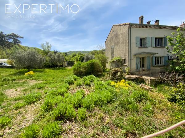 SOUS COMPROMIS Apt : Maison mitoyenne de 88.5m² avec terrasse et jardin potager