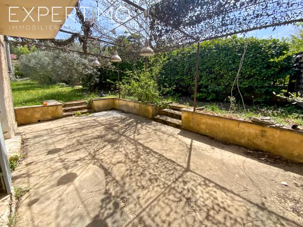 SOUS COMPROMIS Apt : Maison mitoyenne de 88.5m² avec terrasse et jardin potager