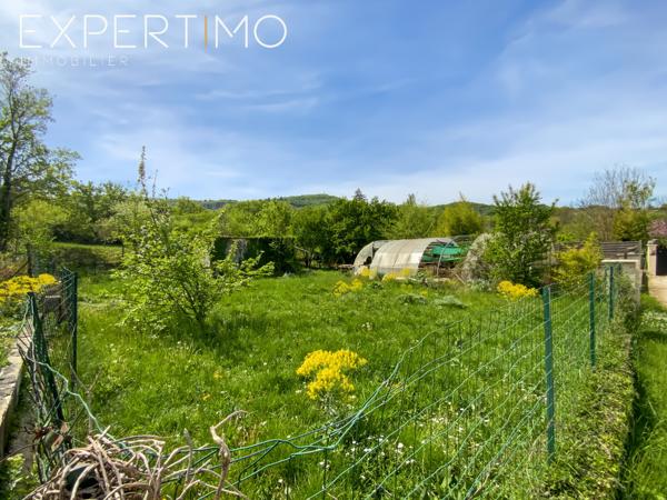SOUS COMPROMIS Apt : Maison mitoyenne de 88.5m² avec terrasse et jardin potager