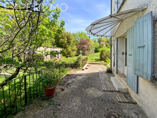 SOUS COMPROMIS Apt : Maison mitoyenne de 88.5m² avec terrasse et jardin potager