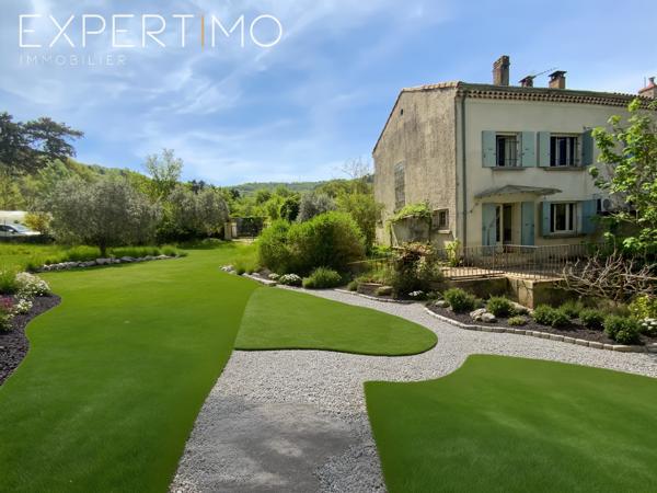 SOUS COMPROMIS Apt : Maison mitoyenne de 88.5m² avec terrasse et jardin potager