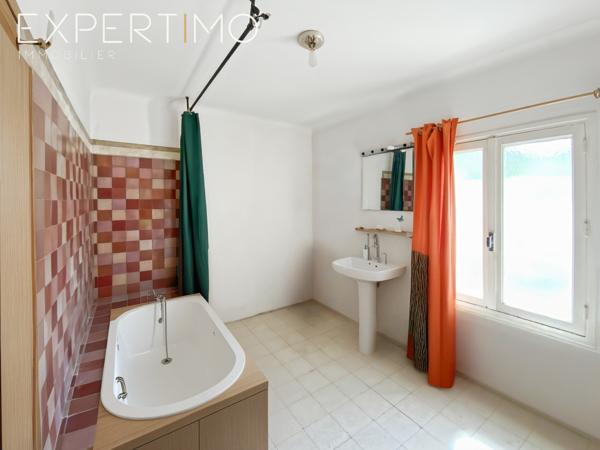 SOUS COMPROMIS Apt : Maison mitoyenne de 88.5m² avec terrasse et jardin potager