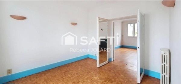 Maison de ville avec jardin plat et garage