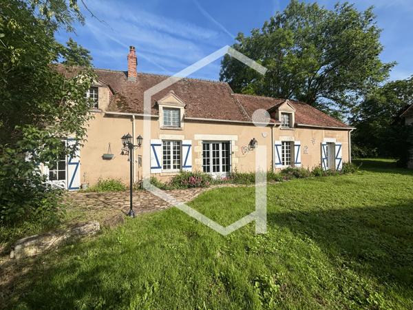 Authentique propriété de caractère avec granges, dépendances et pré