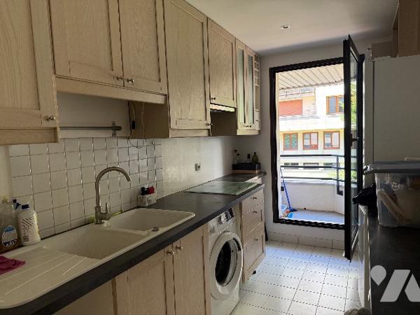 Appartement trois pièces deux chambres 76m² avec cave et parking