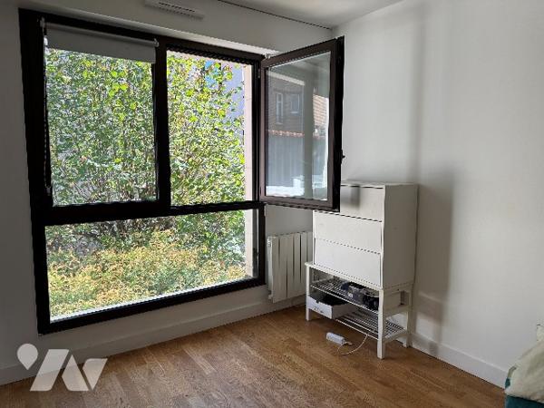 Appartement trois pièces deux chambres 76m² avec cave et parking