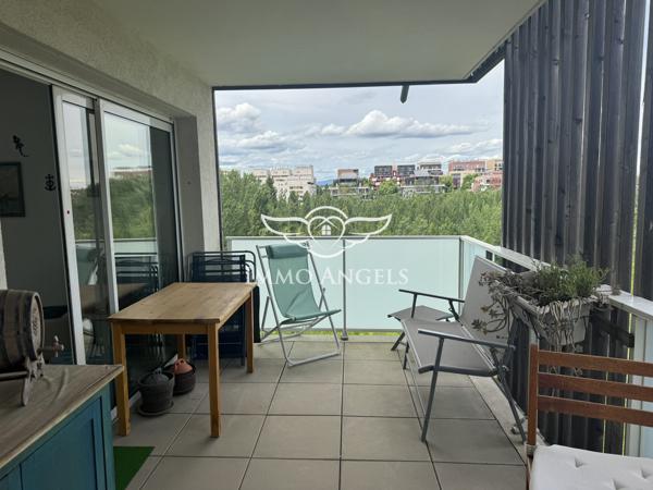 T2 avec terrasse sur parc Charpak