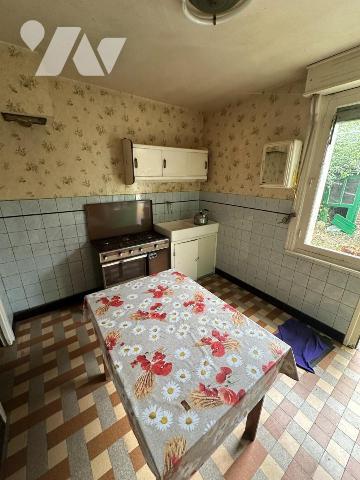 ISBERGUES - Maison semi individuelle de 1955 - 3 chambres - 81 m² habitables 