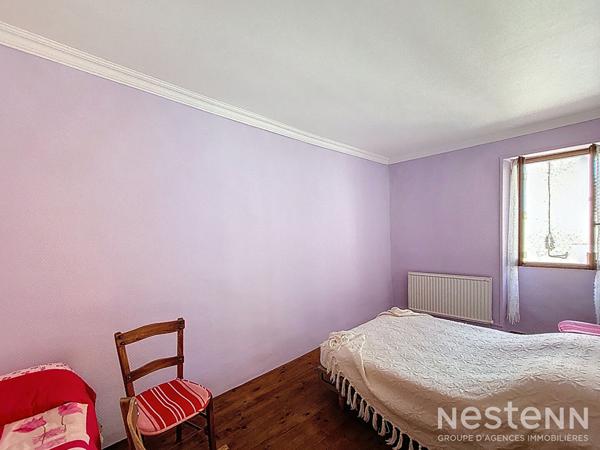 A Vendre Maison de ville en pierre de 123 m² habitable de plain-pied à proximité immédiate des commodités