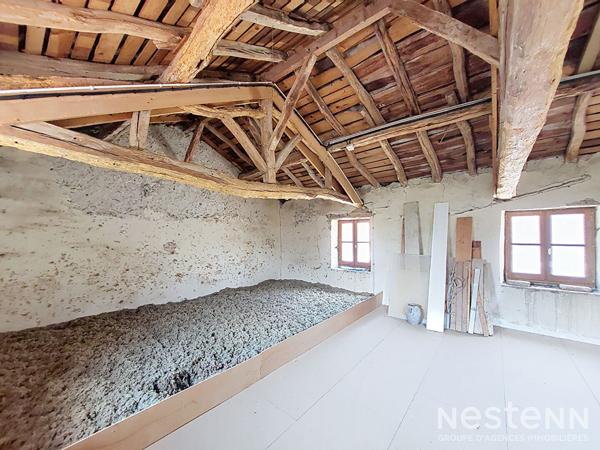 A Vendre Maison de ville en pierre de 123 m² habitable de plain-pied à proximité immédiate des commodités