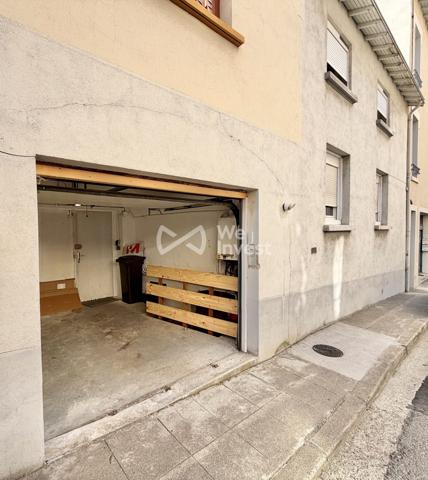 Maison de ville de type 4 avec terrasse et garage pour citadine.