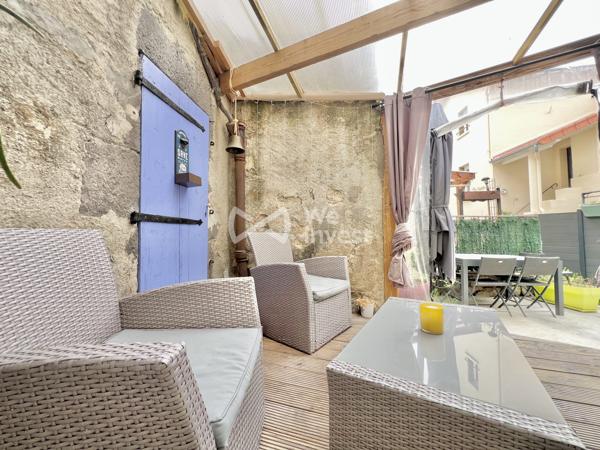 Maison de ville de type 4 avec terrasse et garage pour citadine.