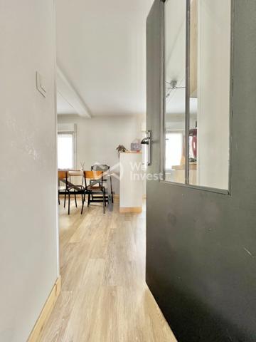 Maison de ville de type 4 avec terrasse et garage pour citadine.