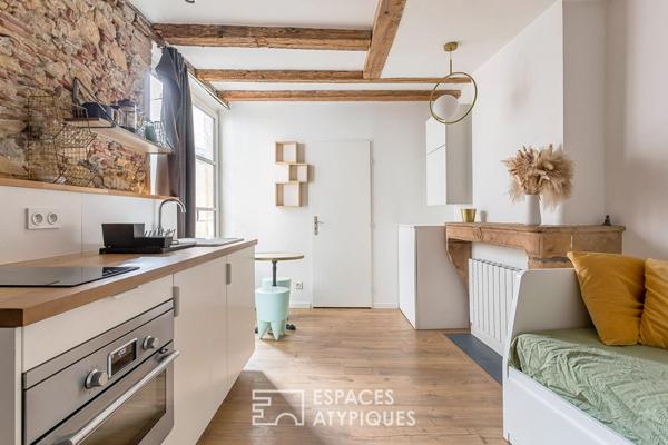 Studio rénové avec pierres apparentes au coeur de Saint-Paul