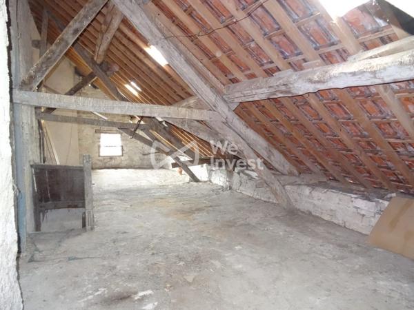 À vendre – Immeuble avec local commercial et potentiel d’habitation