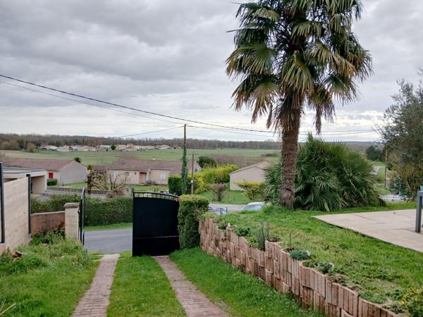 Maison de plain-pied + terrain clos à Roullet-Saint-Estèphe