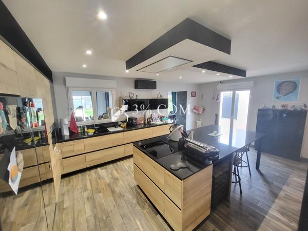 Maison 10 pièce(s) 4 chambre(s) 230 m²