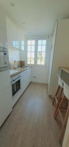 Appartement 1 etage - 2 chambres - box garage - aucun travaux - cuisiné équipée - séjour salon - double exposition - idéal jeune couple - étudiant - femme avec enfants