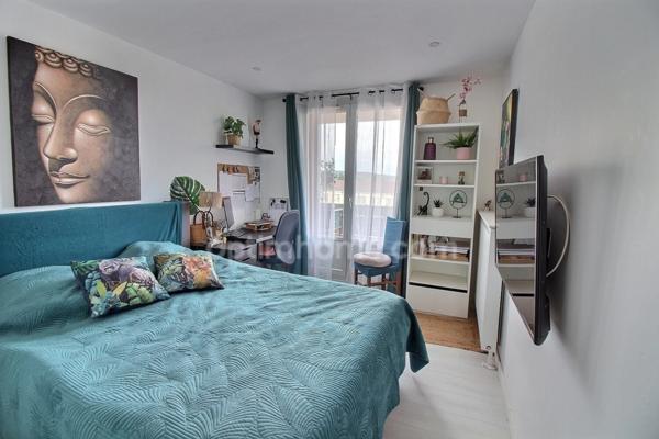 Appartement 4 pièces de 67 m2 avec balcons et parking à vendre à POISSY (78)