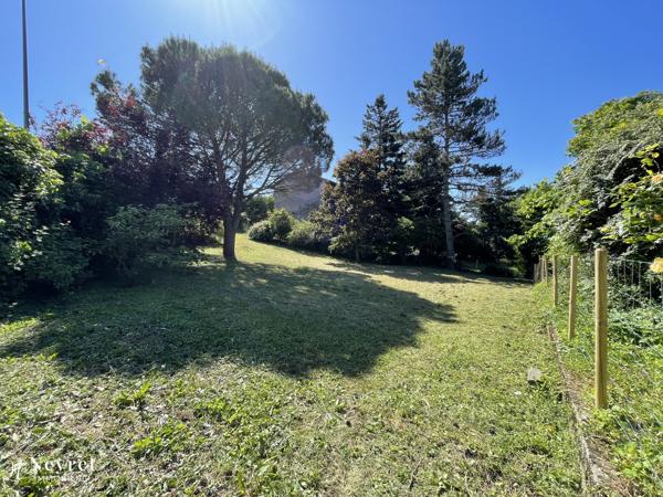 Terrain au calme proche centre