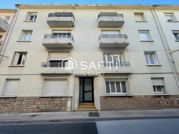 Immeuble 7 appartements avec balcon et cave,