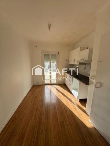 Immeuble 7 appartements avec balcon et cave,