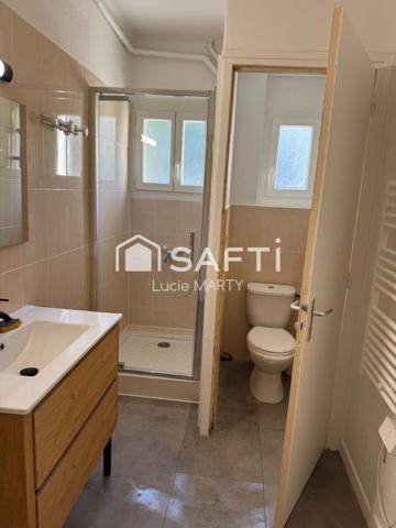 Immeuble 7 appartements avec balcon et cave,