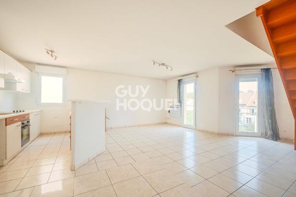 Appartement T3 de 63 m2 (72 m2 au sol) de Standing à Lamorlaye - secteur Centre-ville