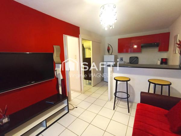 Appartement T2/cabine en rdj avec terrasse, emplacement véhicule, piscine.