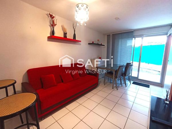 Appartement T2/cabine en rdj avec terrasse, emplacement véhicule, piscine.