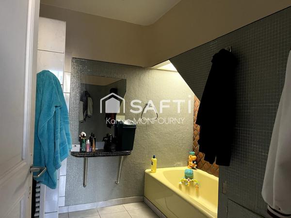 Immeuble 3 logements et un commerce