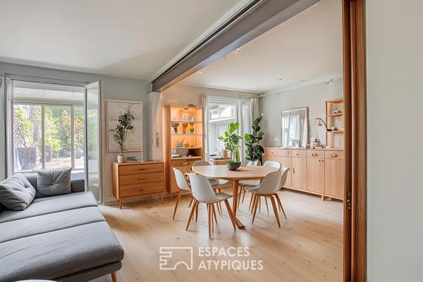 Maison aux touches industrielles avec ses deux terrasses et son garage