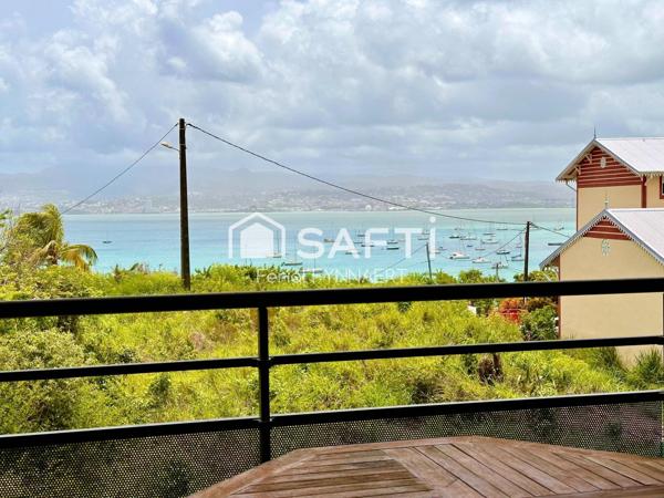 App T2 vue mer avec place de parking et cave