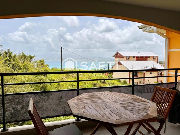 App T2 vue mer avec place de parking et cave