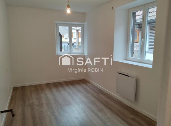 Duplex chaleureux avec extérieur