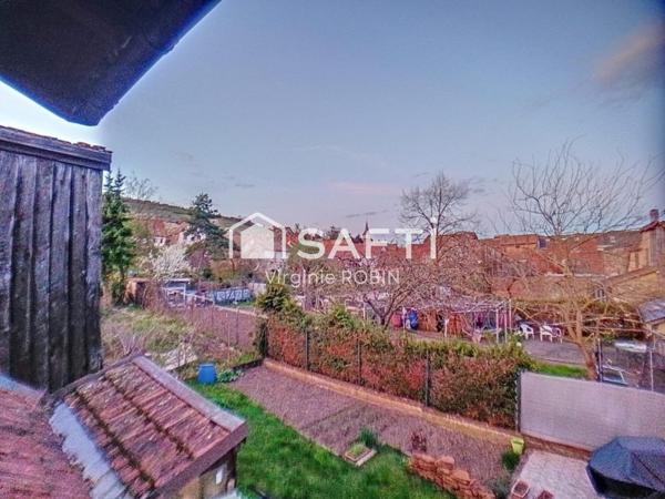 Duplex chaleureux avec extérieur