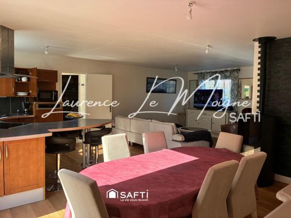 Maison de plain pied, dans un environnement calme proche du centre