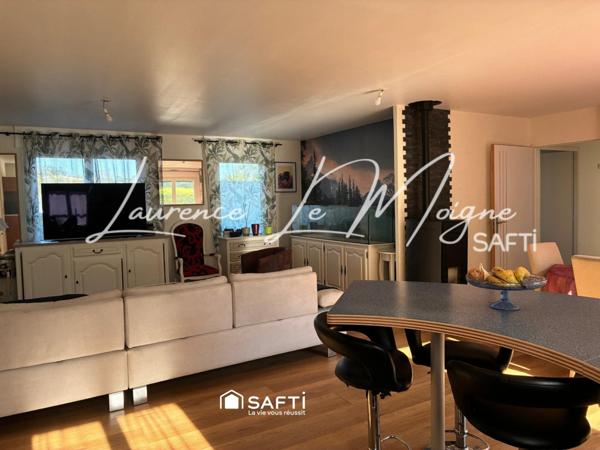 Maison de plain pied, dans un environnement calme proche du centre