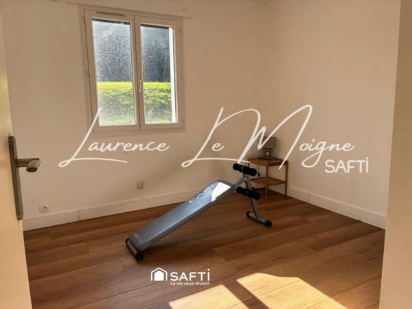 Maison de plain pied, dans un environnement calme proche du centre