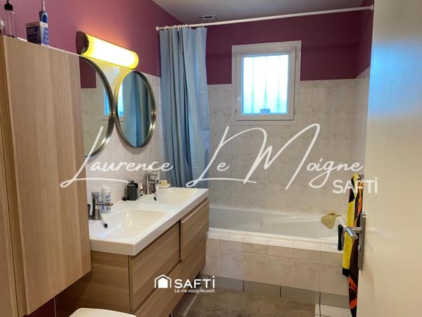 Maison de plain pied, dans un environnement calme proche du centre