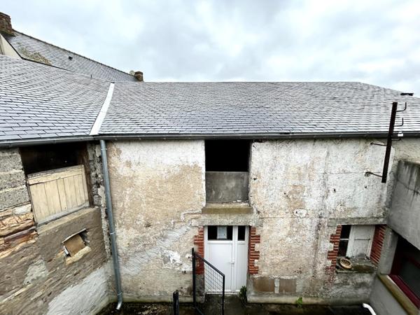 Local commercial idéalement situé + stockage + appartement