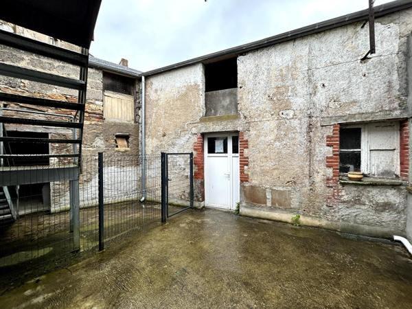 Local commercial idéalement situé + stockage + appartement