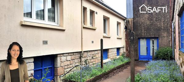 Maison avec ensemble de bâtiments