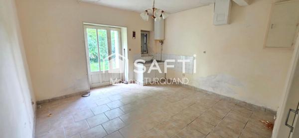 Immeuble à rénover comprenant 3 logements.