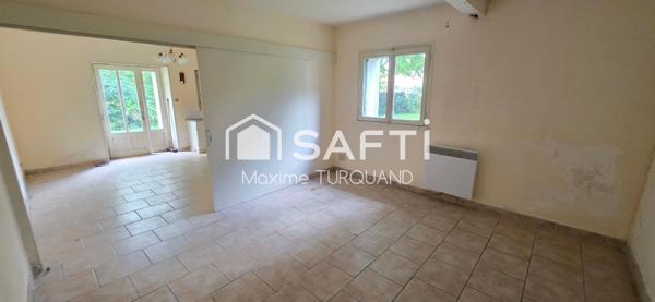 Immeuble à rénover comprenant 3 logements.