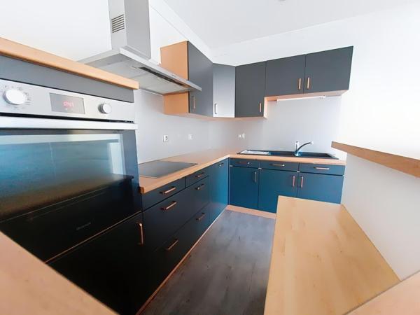 Appartement T4 avec terrasse, garage et parking